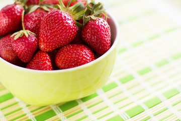 Fresh ripe perfect strawberry at the plate.