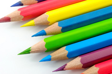Colored pencils on white background