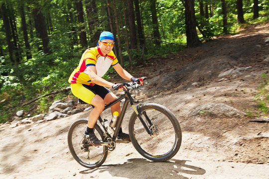 male riding a mountain bike