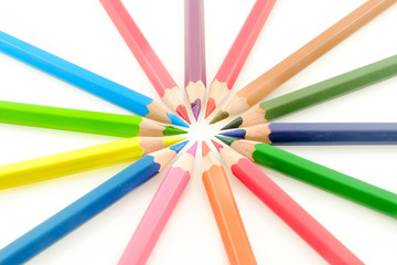 Naklejka premium Colored pencils on white background