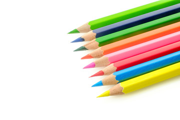 Colored pencils on white background