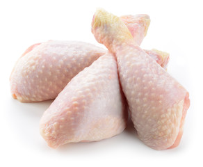 Raw chicken legs isolated on a white background