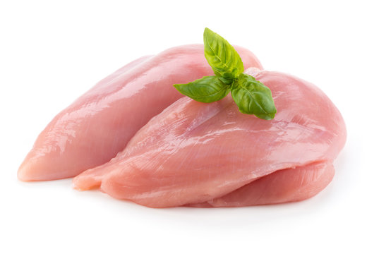 Raw chicken fillets close up isolated on white