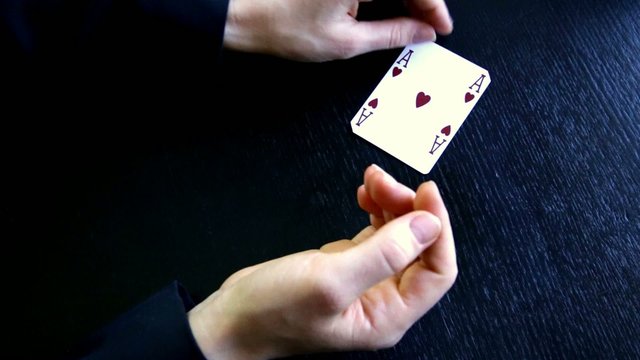 hand taking out ace up your sleeve