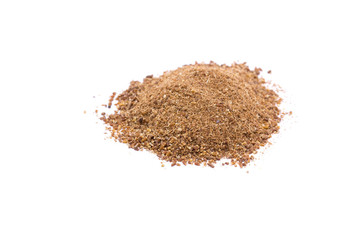 Crushed cumin isolated on white background.