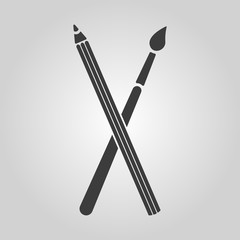 The crossing pencil with a brush icon. Painting and drawing symbol. Flat
