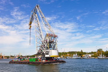Huge floating crane at work in port of Gdynia, Poland.