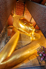 The Reclining Buddha at  Wat Pho (Pho Temple) in Bangkok, Thailand