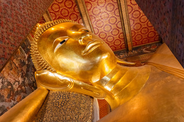 The Reclining Buddha at  Wat Pho (Pho Temple) in Bangkok, Thailand