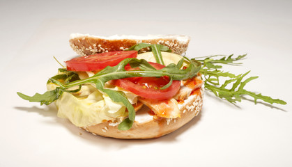 Fresh bagel sandwich isolated over white background
