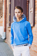 Obraz premium Handsome young man portrait outdoors