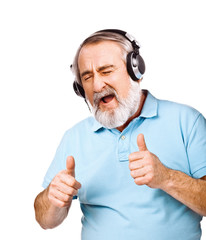 Old guy listening to music on his headphones