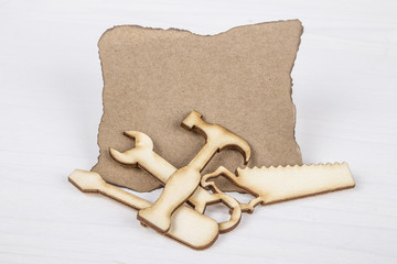 template with wooden tools figurines