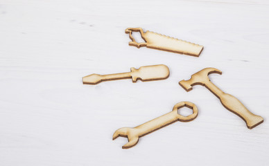 template with wooden tools figurines