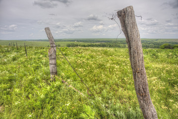 old wooden fence on hilltop, Flint Hills, Tallgrass Prairie National Preserve, Kansas