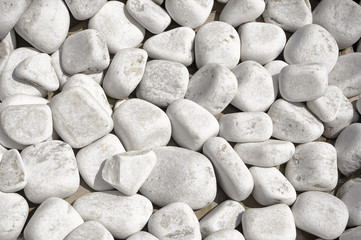 Background with sea pebbles in white color
