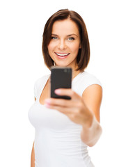 Fototapeta premium happy woman with smartphone