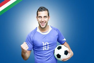 Italian fan celebrates on blue background