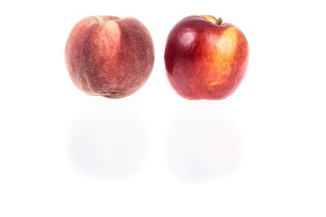 nectarine and peach on white