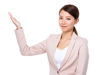 Young Businesswoman with hand presentation