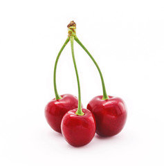 Ripe red cherries isolated on white