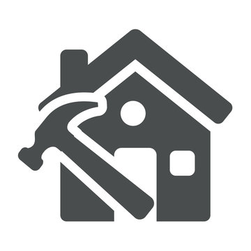 Icono casa con simbolo construccion gris