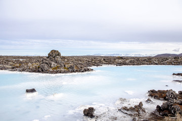 The lagoon is a man-made lagoon which is fed by the water output of the nearby geothermal power plant Svartsengi