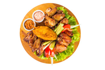 Fried chicken wings with vegetables
