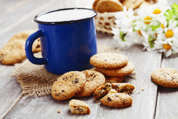 Cookies and mug with milk