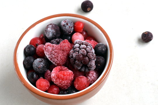 Frozen Summer Berries With Heart-Shaped Raspberry