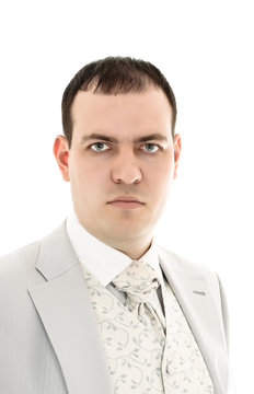 serious young man in wedding suit portrait