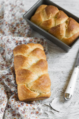 brioche on a light wooden background
