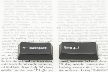 Enter and Backspace Computer Keys on a Book Page