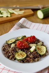 black rice with zucchini, tomatoes and paprika