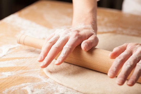 Hand, apron, flour.