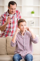 Father and son at home