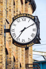Naklejka premium Old wall clock at Camden Lock Market Hall