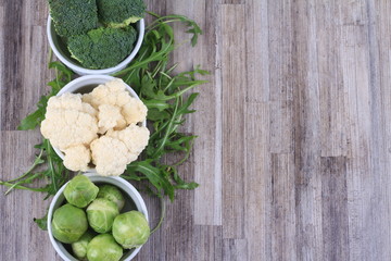 Healthy Organic Vegetables on a Wooden Background
