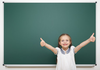 Schoolgirl near school board