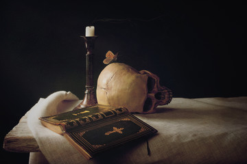 Bible, Skull, Candle as Symbol for Life, Death and Resurrection © Ezio Gutzemberg
