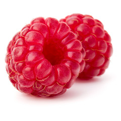 ripe raspberries isolated on white background close up