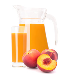 Peach fruit juice in glass jug