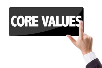 Businessman pressing button with the text: Core Values