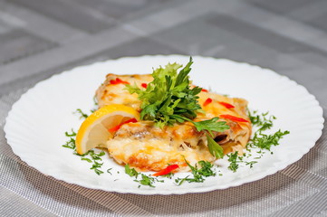 lettuce with shrimps by greenery and lemon