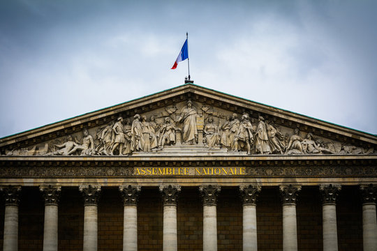 Detail of front facade of Assemblee Nationale building in Paris