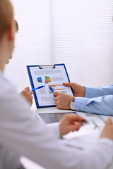 Group of business people working together in office