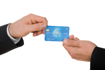Two Businessman Holding Credit Card
