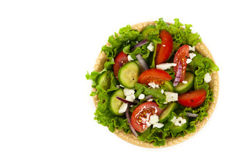 Salad. Mediterranean Salad with Feta Cheese on a white background. Selective focus.