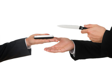Businessmen Hands With Knife And Mobile Phone