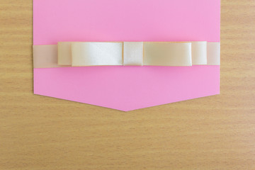 ribbon and pink card